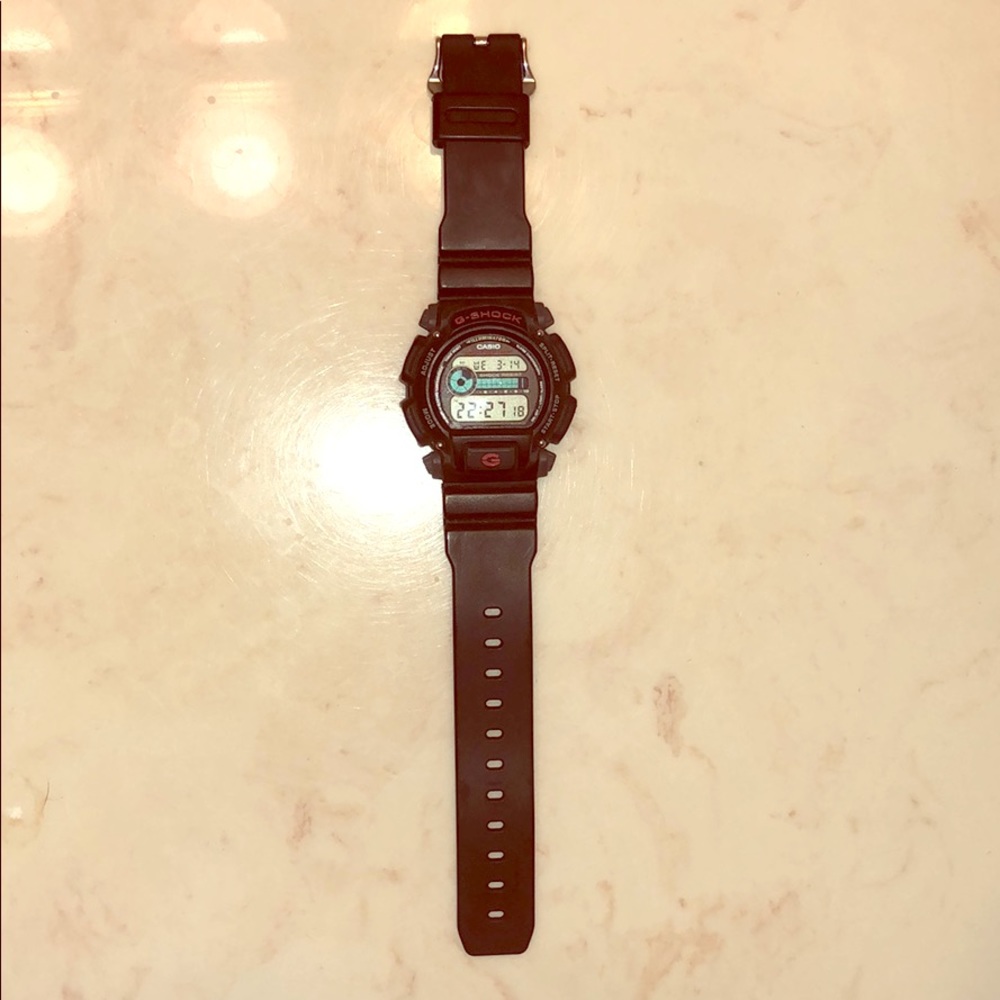 Black unisex G shock watch with red detailing